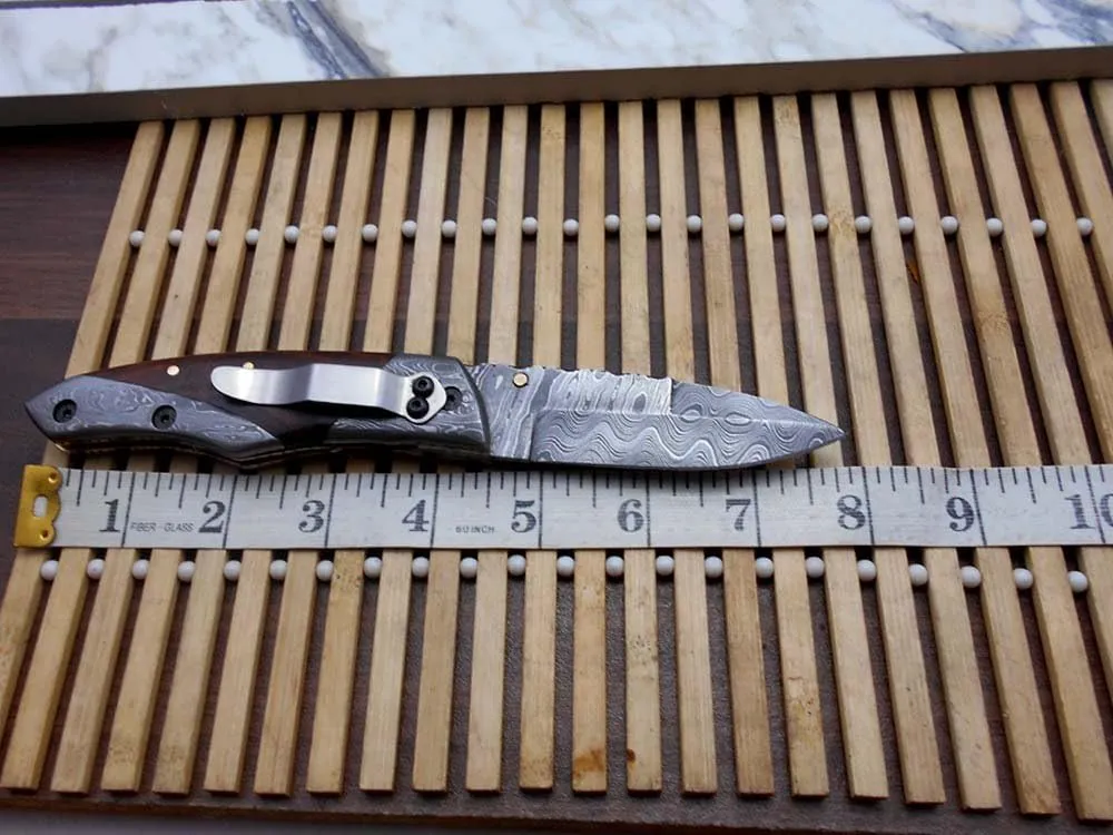 8" Long Folding Knife with Pocket Clip, Hand Forged Damascus Steel 3.5" Blade. Available in Walnut Wood, Bull Horn, Ram Horn, Red & Blue Scale with Damascus Bolster, Cow Hide Leather Sheath