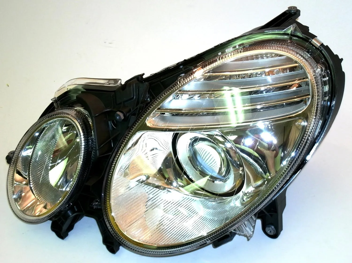 OEM Mercedes Benz HALOGEN HEADLAMP (LEFT) E 280 320 350 550 63 AMG (07-09) - Hella 2118203361